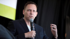 Stock Market Today: Dow Skids, AI Play Dives As Peter Thiel Exits; Netflix Divvies Up Its Shares (Live Coverage)