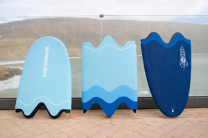 Soft-top surfboard splits for travel and stowage