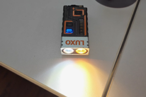 Magnetic dual-lamp torch doubles as an X-arc survival lighter