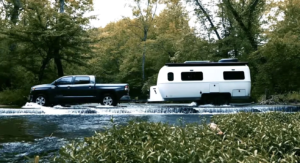 Gorgeously curvy fiberglass camper preps for 4-season off-grid RV life