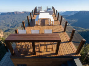 Extra-wide tiny house puts the party on the roof
