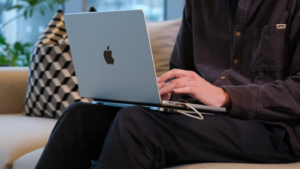 Slim power bank slides under a laptop for juice on the go