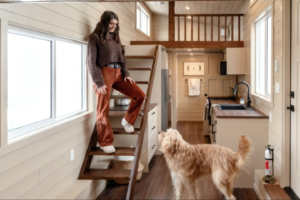Family friendly tiny house fits two bedrooms in a towable frame