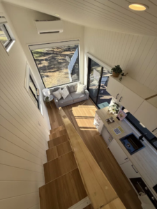 Two-bedroom tiny house combines portability with a roomy interior