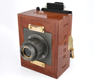 Gloriously retro wooden box camera contains its own film processing lab