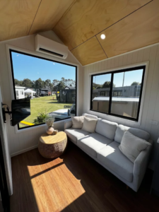 Spacious tiny house skips loft living for single-floor comfort
