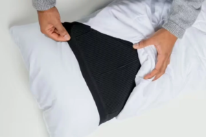 Vibrating pillow sleeve warns deaf sleepers of burglars and fires