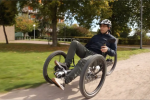 Telescoping recumbent e-trike is like a carbon fiber cannon