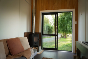 Tiny house opens up to the outside with dual-door design