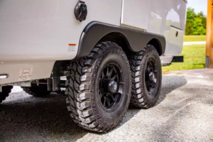 Oliver ruggedizes dual-hull camper for boundless exploration