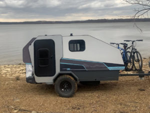 Transformational cubist teardrop camper disappears bed to free space